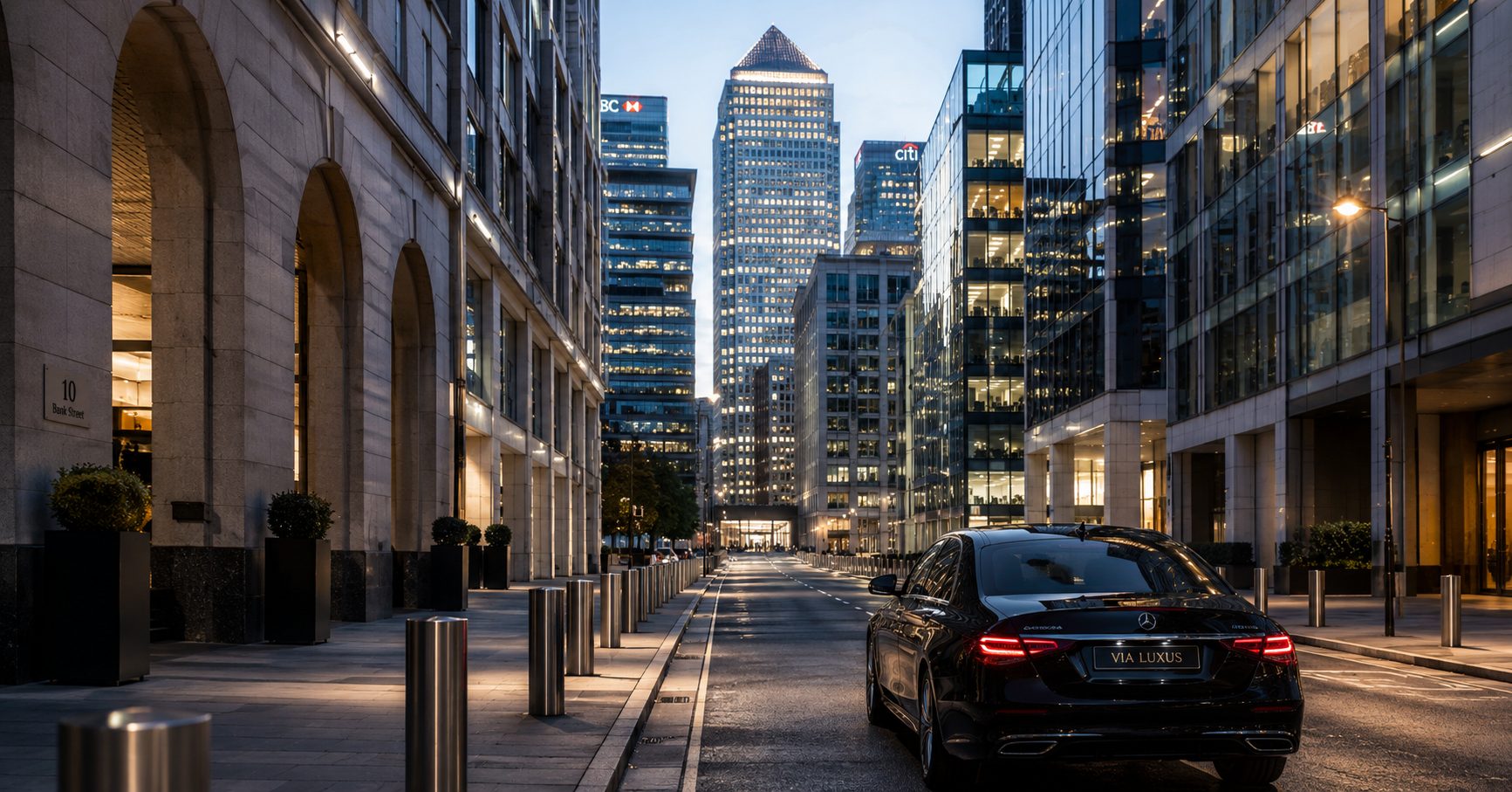 A black Mercedes waiting in a city financial district at twilight